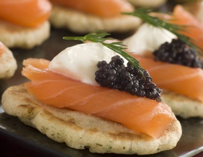 Norwegian smoked salmon blinis with crème fraiche and caviar