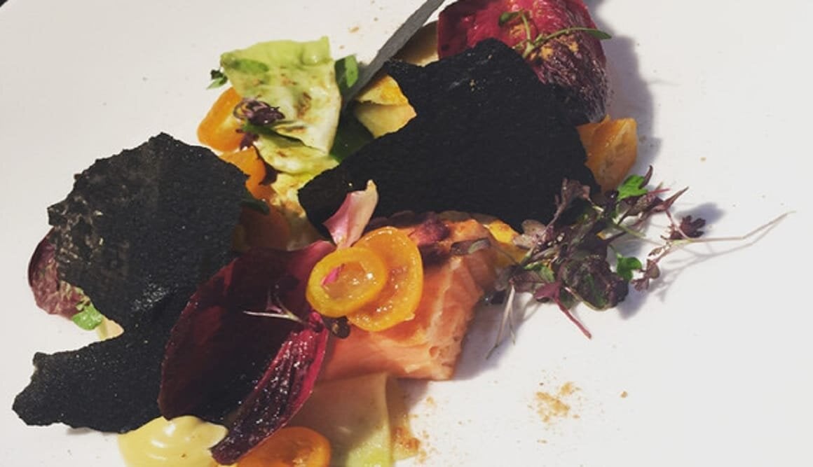 Roasted Norwegian Fjord Trout, carrot and preserved kumquat salad and squid ink crackers with liquorice