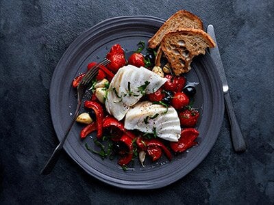 Norwegian cod with red peppers and tomatoes