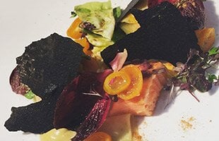 Roasted Norwegian Fjord Trout, carrot and preserved kumquat salad and squid ink crackers with liquorice