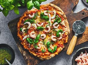 Pizza with Norwegian prawns