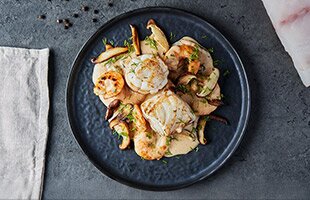 Roll mops of Norwegian Saithe with prawns and shiitake mushrooms