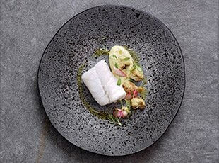 Poached Skrei, Cauliflower Purée and Pickled Radishes